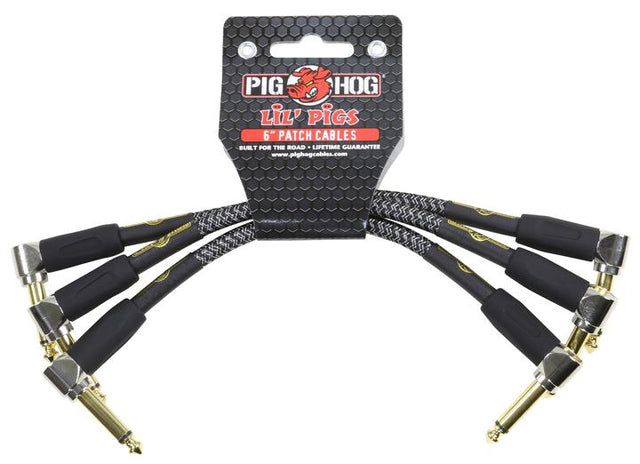 The image shows a set of Pig Hog "Lil' Pigs" 6-inch patch cables with gold-plated 1/4" right-angled connectors and black textured jackets. Designed for guitarists to connect effects pedals on pedalboards, these cables offer reliable signal transmission, space-saving design, and professional-grade durability. Ideal for creating tidy, efficient effects chains with minimal signal loss.