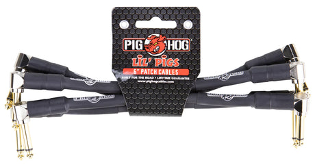 The image shows a set of Pig Hog "Lil' Pigs" 6-inch audio patch cables with right-angle gold-plated plugs and black jackets with branding. These short, durable cables are designed for connecting guitar pedals, studio gear, and other audio devices in compact setups. Packaged for musicians and audio pros, they feature a "lifetime guarantee" and are built for reliable, road-ready performance.