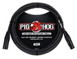 The image shows a Pig Hog Tour Grade 10-foot microphone cable with XLR male to female connectors. It features a black woven outer sleeve, the red Pig Hog pig mascot logo, and branding that highlights "Built for the Road" and a lifetime guarantee. This professional-grade cable is designed for durable, reliable use by touring musicians and audio professionals.