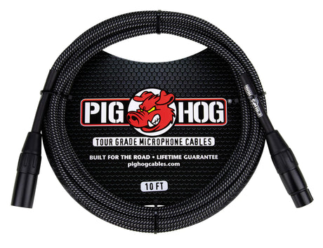 The image shows a Pig Hog Tour Grade 10-foot microphone cable with XLR male to female connectors. It features a black woven outer sleeve, the red Pig Hog pig mascot logo, and branding that highlights "Built for the Road" and a lifetime guarantee. This professional-grade cable is designed for durable, reliable use by touring musicians and audio professionals.