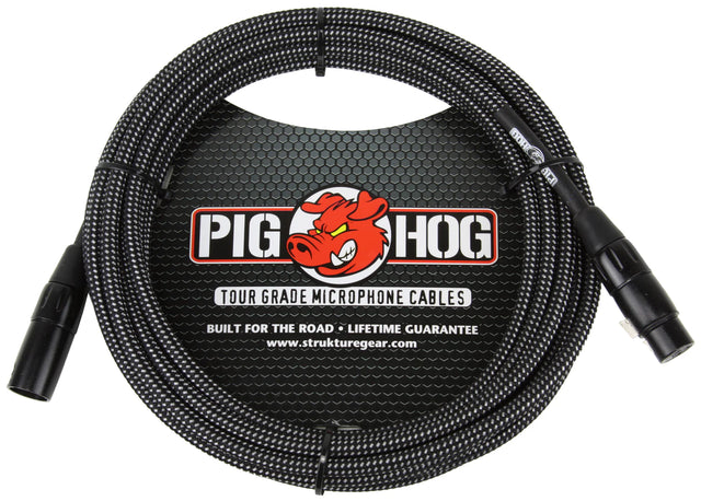 The image shows a Pig Hog Tour Grade microphone cable with XLR male to female connectors. It features a black woven cable, the red pig mascot logo, and branding that includes "Built for the Road" and "Lifetime Guarantee." This professional-grade cable is designed for touring musicians and live performances. Manufacturer's website: strutturegear.com.