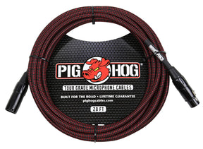 The image shows a Pig Hog tour-grade 20-foot XLR microphone cable with black and red braided exterior. It features male and female XLR connectors, Pig Hog branding with a red pig logo, and text highlighting its durability, "Built for the Road" and "Lifetime Guarantee." Designed for professional audio use, it is made to withstand heavy-duty use in live performances and frequent setups.
