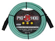 The image shows a 15-foot Pig Hog Professional Series XLR microphone cable with seafoam green/turquoise jacket and black metal connectors. It features male to female connectors, the red pig logo, yellow "HEX" badges, and "Built for the Road • Lifetime Guarantee" branding. Designed for professional audio use, this durable cable is ideal for microphones and audio equipment in live and studio settings.