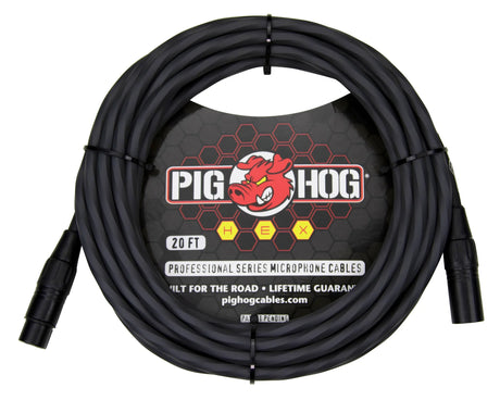 The image shows a Pig Hog Professional Series 20-foot black XLR microphone cable with connectors at both ends. The packaging displays the Pig Hog logo featuring a red pig mascot and hexagonal pattern. Labeled "built for the road" with a lifetime guarantee, this cable is designed for professional audio use in studios and live sound setups.