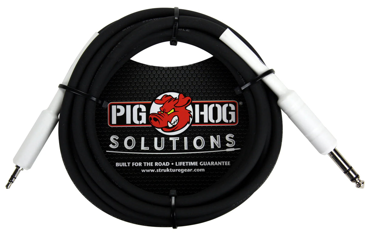 The image shows a Pig Hog Solutions black musical instrument cable with white 1/4" connectors, partially obscured by its coiled shape. A circular Pig Hog label with a red pig logo reads "Solutions," featuring the tagline "Built for the Road • Lifetime Guarantee" and the website "www.strukturegear.com." This durable cable is used for connecting electric instruments to amps, pedals, or audio gear.