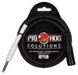 The image shows a Pig Hog audio cable by Pig Hog Solutions, featuring their red pig mascot on black packaging. It is a 6-foot cable with a 1/4" TS connector on one end and a black 3-pin XLR connector on the other. The black cable has white/silver housings and is built for professional use with a lifetime guarantee. It connects instruments like guitars and keyboards to mixing boards or audio interfaces.