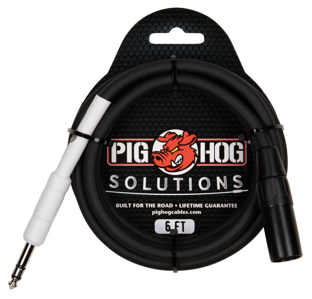 The image shows a Pig Hog audio cable by Pig Hog Solutions, featuring their red pig mascot on black packaging. It is a 6-foot cable with a 1/4" TS connector on one end and a black 3-pin XLR connector on the other. The black cable has white/silver housings and is built for professional use with a lifetime guarantee. It connects instruments like guitars and keyboards to mixing boards or audio interfaces.