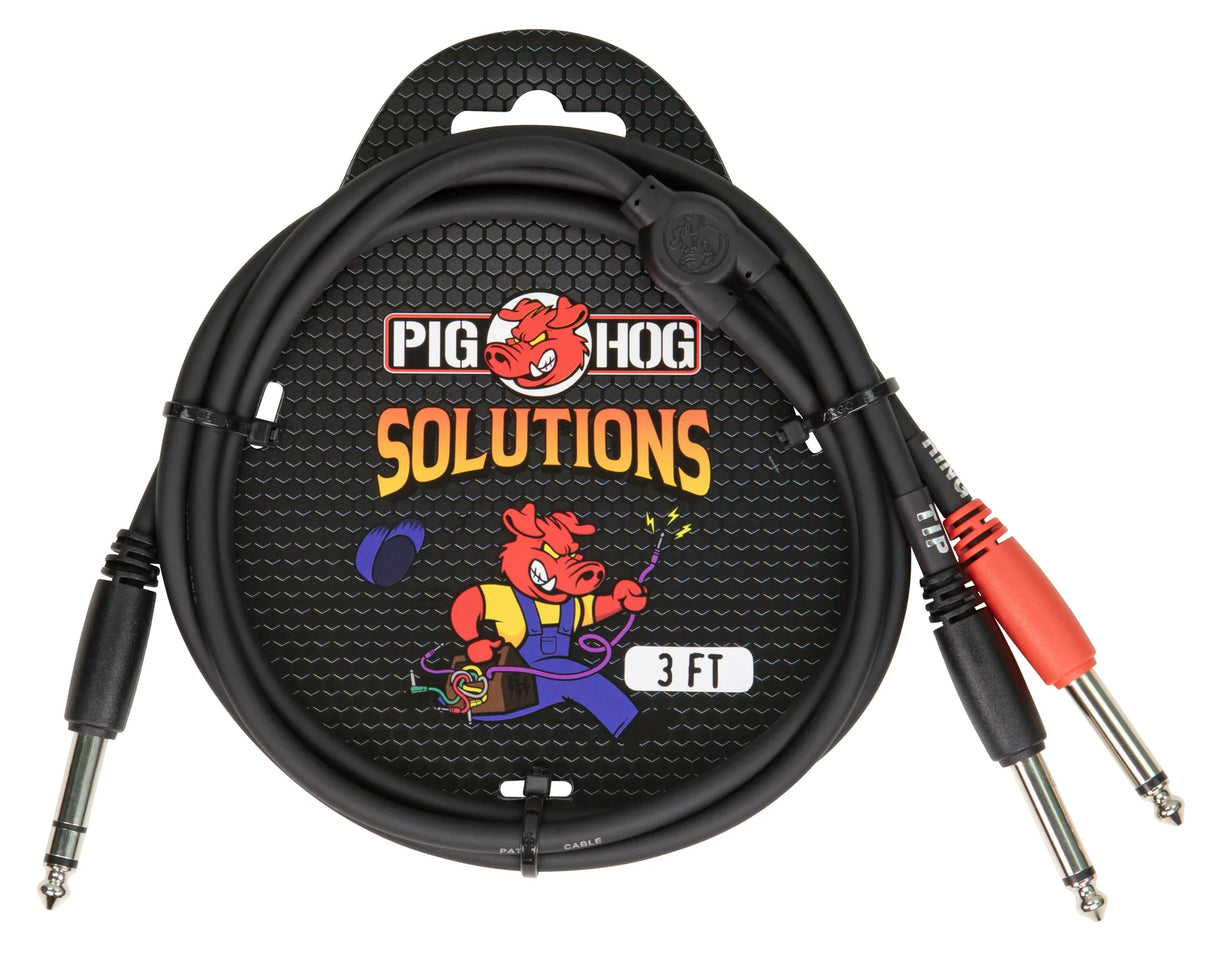 The image shows a Pig Hog brand 3-foot black audio cable with 1/4" connectors on both ends, used for electric instruments. The cable is in Pig Hog packaging featuring a black hexagonal mesh background, the "PIG HOG" brand name, "SOLUTIONS" in orange, and a red pig mascot holding audio gear. One connector has a red accent. This instrument cable connects guitars and other electric instruments to amplifiers and audio equipment.