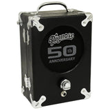 The image shows a black Pignose 50th Anniversary portable guitar amplifier with chrome corner protectors and hardware. It features the Pignose logo, "50th Anniversary" text, a carry handle, input jack, and control knob on a compact, suitcase-style rectangular design. This classic battery-powered amp, popular since the 1970s, is known for its vintage road case look and portability.