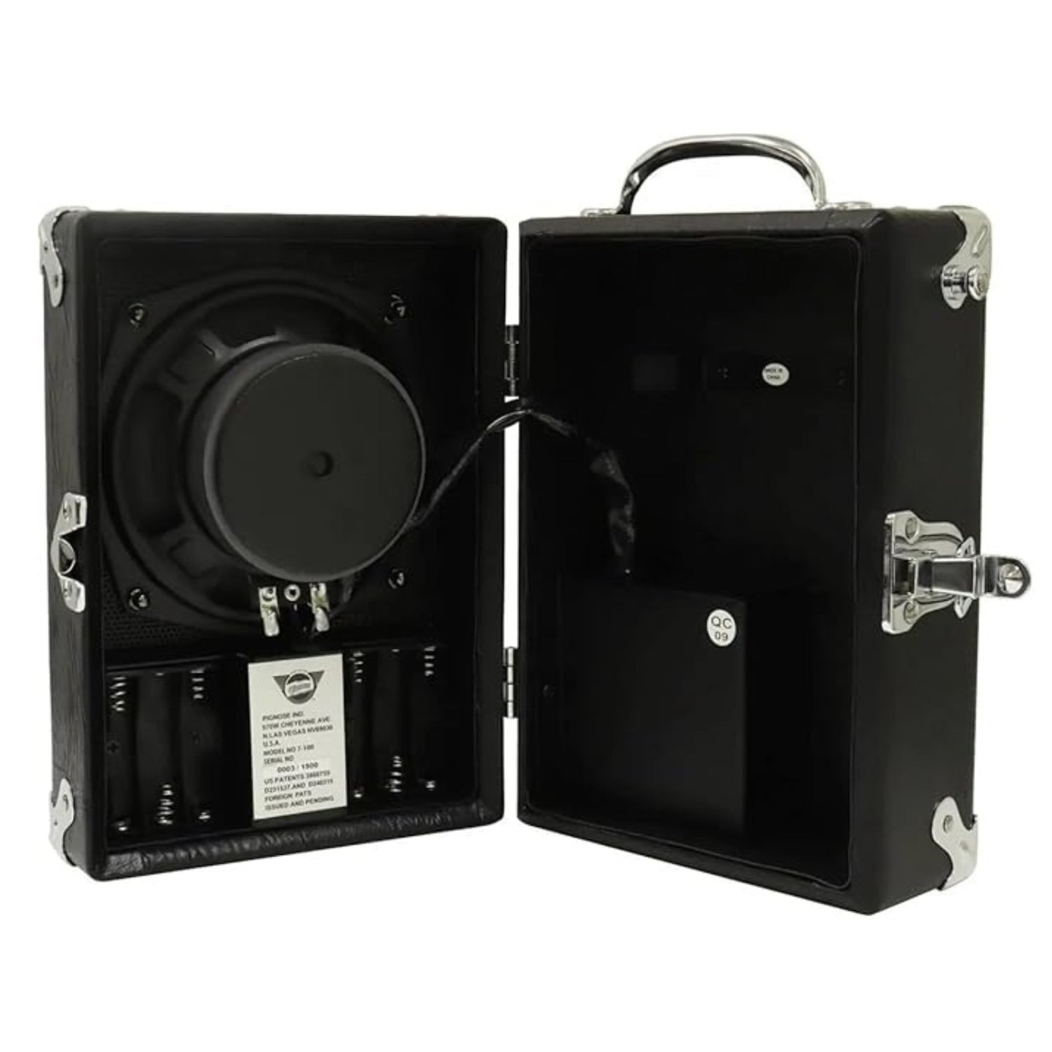 The image shows a portable DJ turntable inside a black briefcase-style carrying case. It features a black vinyl platter on the left, a tonearm, and a black foam-padded interior. The case has chrome hardware, including hinges, latches, and a handle. A product label is visible in the lower left. Designed for easy transport, this durable turntable system is ideal for DJs and music enthusiasts on the go.