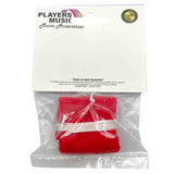 The image shows a red Players Music rosin block in clear plastic packaging with a header card. The packaging features the Players Music logo, a rainbow stripe design, and a gold seal. It includes a "Good as Gold Guarantee" with warranty details. Rosin is an essential accessory for bowed string instruments, used to create friction between the bow hair and strings.