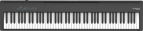 The image shows a Roland FP-30X digital piano with a full 88-key weighted keyboard in a sleek black case. The Roland logo is visible in the top right corner, with control lights on the top panel above the keys. Known for its realistic piano sound and feel, this portable model suits beginners and experienced players alike, featuring multiple voices, connectivity options, and a minimalist professional design.