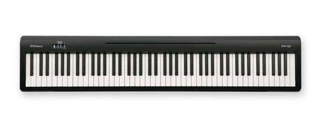 The image shows a Roland FP-10 digital piano with 88 full-size keys in a sleek black casing. The Roland logo is on the left and the FP-10 model name on the right. It features a minimalist control panel on the upper left and a compact, portable design without visible built-in speakers. This entry-level digital piano offers weighted keys and quality sounds, ideal for students, home use, and performers seeking an accessible, professional instrument.