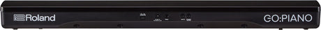 The image shows the back panel of a Roland GO:PIANO digital piano, a sleek black portable keyboard from Roland's GO series. Visible are the Roland logo, "GO:PIANO" branding, and various input/output ports for connecting to devices, power, and audio equipment. This model offers an affordable, compact solution with authentic piano sounds for beginners and musicians on the go.