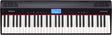 The image shows a Roland GO:PIANO digital keyboard with a full-sized black and white key layout. The control panel features a blue LCD displaying "GO Grand," various buttons for sound selection and volume, and speaker grilles above. The piano has a sleek black, portable design typical of Roland's entry-level GO series, ideal for beginners and casual players seeking a compact, lightweight digital piano.