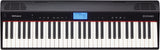 The image shows a Roland GO:PIANO digital keyboard with a full-sized black and white key layout. The control panel features a blue LCD displaying "GO Grand," various buttons for sound selection and volume, and speaker grilles above. The piano has a sleek black, portable design typical of Roland's entry-level GO series, ideal for beginners and casual players seeking a compact, lightweight digital piano.