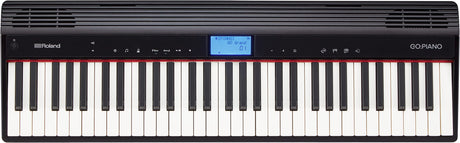 The image shows a Roland GO:PIANO digital keyboard with a full-sized black and white key layout. The control panel features a blue LCD displaying "GO Grand," various buttons for sound selection and volume, and speaker grilles above. The piano has a sleek black, portable design typical of Roland's entry-level GO series, ideal for beginners and casual players seeking a compact, lightweight digital piano.