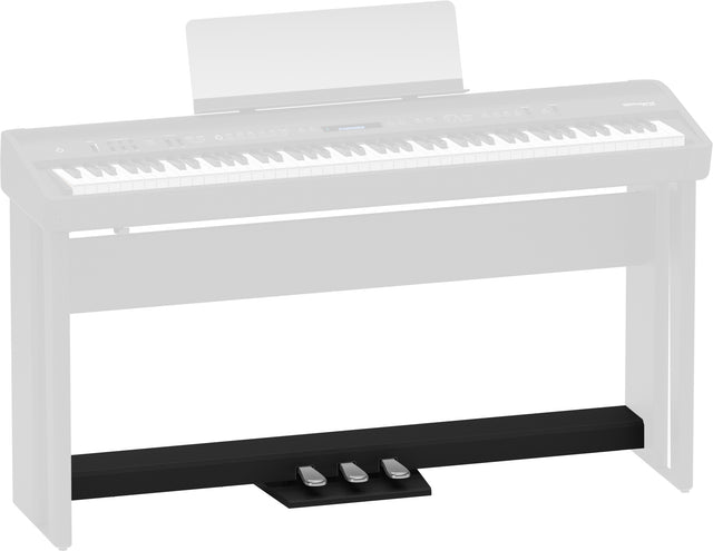 The image shows a three-pedal unit for a digital piano, featuring a black base with three metallic pedals—sustain, soft, and sostenuto. It is designed to replicate the pedal functions of an acoustic piano, enhancing the playing experience. In the background, a faint outline of a digital piano with a music stand is visible, indicating the pedal unit’s intended use with such instruments.