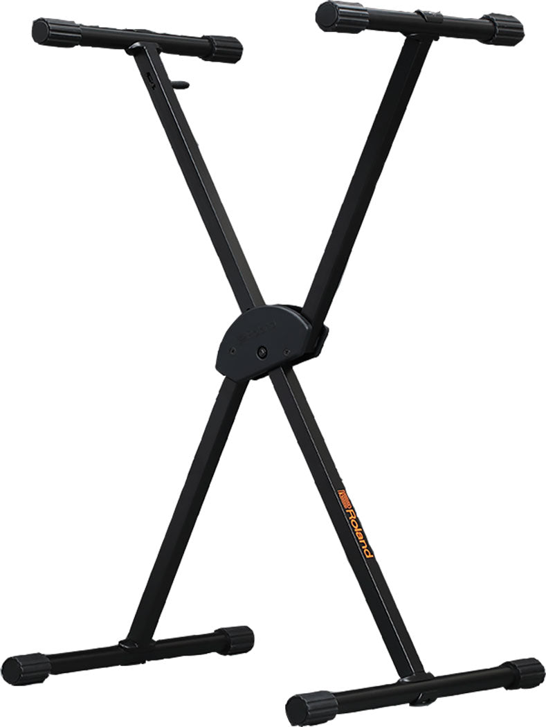 The image shows a black, adjustable X-style keyboard stand made of sturdy metal. It features height adjustment, adjustable upper arms with protective end caps, a central locking mechanism, and stable base feet. The stand, possibly branded, supports keyboards, synthesizers, or digital pianos, offering portability and stability for musicians during practice, recording, or live performances.