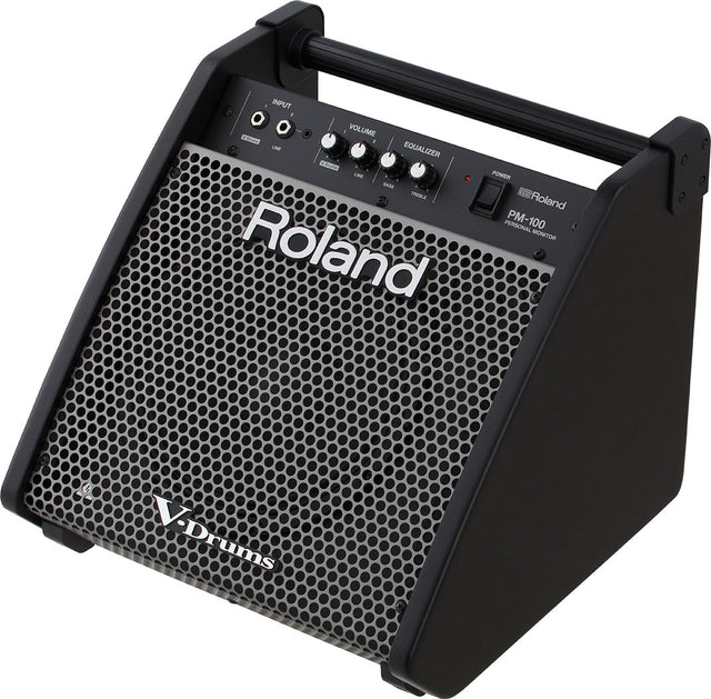 The image shows a Roland PM-100 Personal Monitor, a compact, wedge-shaped speaker designed for electronic drum kits (V-Drums). It features multiple input jacks, volume and EQ controls, a power switch, a protective mesh grille, and a carrying handle. Its angled design projects sound upward, providing electronic drummers with clear personal amplification for practice, rehearsal, or performance.