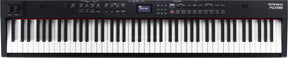 The image shows a Roland RD-88 digital stage piano with an 88-key weighted keyboard, control panel with knobs and buttons, and a small LCD screen. It has a sleek black design for professional live or studio use and features clear Roland branding. This versatile instrument is suited for musicians needing realistic piano sounds and multiple voices in a portable, full-featured keyboard.