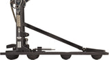 The image shows a bass drum pedal with a metal frame, textured footboard, chain drive, tension spring, and adjustable beater assembly. It includes multiple adjustment points for customizing feel and response. This professional-grade pedal enables drummers to strike the bass drum with their foot while keeping hands free for other instruments.