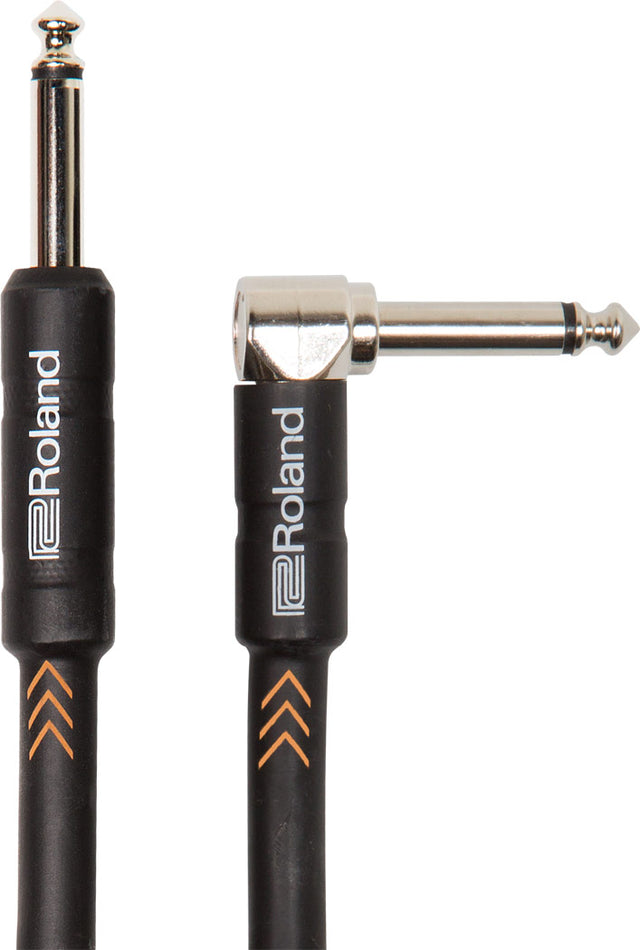 The image shows a Roland-branded instrument cable with a straight 1/4" TS plug on the left and a right-angle 1/4" TS plug on the right. It has a black jacket with orange chevron accents and nickel-plated metal connectors. Designed for guitars, basses, and keyboards, the right-angle plug reduces strain and saves space when connecting to pedals or instruments. The cable features professional-quality Roland branding on both connectors.