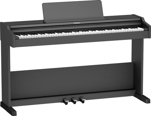 The image shows a Roland digital piano with a full 88-key keyboard, traditional black and white keys, and a dark charcoal finish. It features a built-in music stand, three foot pedals, and a sturdy upright-style cabinet. The Roland logo is visible on the front. Designed to mimic an acoustic piano, it offers weighted keys and digital features like volume control and varied sounds, ideal for home or studio use.