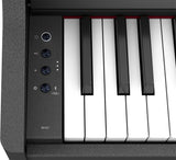 The image shows a digital piano keyboard, likely a Roland RP107, featuring a traditional layout with white and black keys. It has a control panel on the left with rotary knobs, buttons, LED indicators, and digital controls such as power and volume. The piano has a sleek black finish and connectivity options, possibly Bluetooth, offering acoustic feel with electronic features like multiple voices and recording functions.