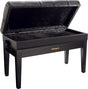 The image shows a Roland piano bench with a sleek black finish, padded tufted seat, adjustable height knob, and an open storage compartment lined with black fabric beneath the seat. It has four sturdy legs and the Roland logo on the front. This bench offers comfortable seating and convenient storage for sheet music and accessories, making it a popular choice for piano and keyboard players.