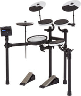 The image shows a Roland electronic drum kit with black drum pads featuring white rims, two cymbal pads, a hi-hat pad, and multiple tom and snare pads. It has adjustable black mounting arms on a sturdy rack, two foot pedals, and a sound module with a display on the left side. This digital drum set offers volume control, diverse sounds, and compact design, ideal for practice, recording, and live use.