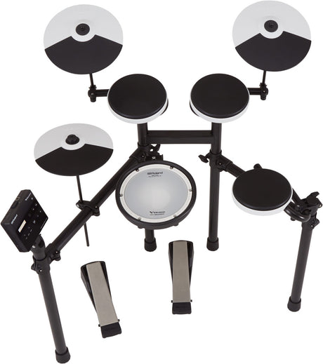 The image shows a Roland V-Drums electronic drum kit featuring multiple black and white drum pads, cymbal pads with sectioned designs, a central white mesh snare pad, and a sturdy black metal rack. It includes an electronic module for sounds and controls, adjustable mounting hardware, and a hi-hat pedal, replicating an acoustic drum set with electronic benefits.