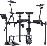 The image shows a modern all-black electronic drum kit featuring four tom pads with mesh surfaces, two cymbal pads on adjustable arms, a kick drum pad, and foot pedals. A drum module with an LCD display is mounted on the left, all supported by a sturdy metal rack. The compact design mimics acoustic drums with realistic rims and professional hardware, ideal for practice, recording, and quiet performance.