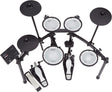 The image shows a Roland electronic drum kit with multiple mesh drum pads, black electronic cymbal pads, a kick drum trigger, hi-hat pedal, and a drum module on an adjustable metal rack. The dual-zone pads and responsive cymbals offer realistic play, while the module provides diverse sounds and settings. This compact kit is ideal for practice, recording, and live use, delivering acoustic-like feel and versatility in a space-saving design.