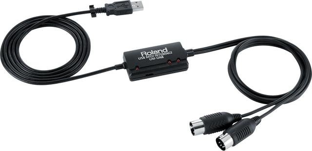 The image shows a Roland UM-ONE USB MIDI Interface cable. It has a USB connector on one end, MIDI IN and OUT 5-pin DIN connectors on the other, and a compact inline module with LED indicators. The black cable connects MIDI instruments like keyboards and synthesizers to computers for recording, playback, and controlling MIDI gear. This reliable device suits musicians integrating digital and vintage MIDI equipment.