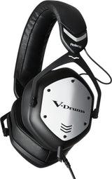 The image shows a pair of Roland V-Drums headphones, designed for electronic drumming. The white and black ear cups display the "V-Drums" branding, and the Roland logo is visible on the headband. These headphones are built for accurate sound reproduction and comfort during extended use, making them ideal for practicing quietly or monitoring electronic drum kits.