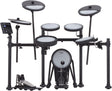 The image shows a Roland electronic drum kit featuring multiple white drum pads, electronic cymbal pads including crash and ride, black metal hardware, a control module with digital display, a large kick drum pad with pedal, and electronic hi-hat cymbals with pedal. This modern digital set simulates acoustic drums, ideal for quiet practice, recording, and performance with volume control and sound versatility.