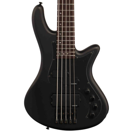 Black electric bass guitar on a white background