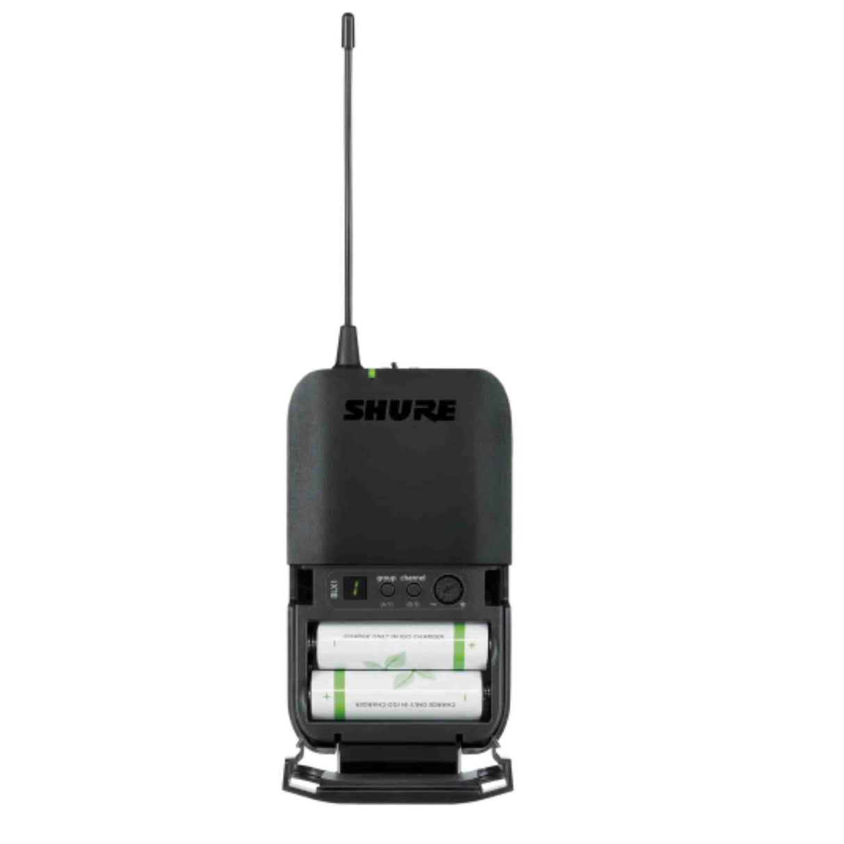 The image shows a Shure wireless bodypack transmitter with a black plastic housing and visible "SHURE" branding. It features an extendable antenna, an open battery compartment with two AA batteries, and a control panel with buttons and an LED indicator. This compact device wirelessly transmits audio from instruments or microphones, offering musicians freedom of movement during live performances.