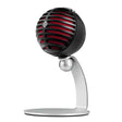 The image shows a professional vintage-style dynamic microphone with a black spherical grille featuring red accents, mounted on a sleek chrome curved stand with a circular base. Its retro mid-20th-century design suits vocal recording, live performances, podcasting, and instrument amplification, likely functioning as a USB or professional audio interface microphone for musicians and content creators.