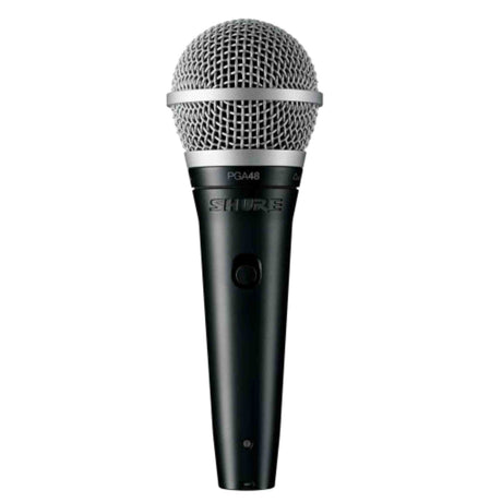 The image shows a Shure PGA48 dynamic microphone with a silver mesh grille, black body, visible "SHURE" branding, "PGA48" model name, an on/off switch on the handle, and an XLR connector at the bottom. This entry-level professional microphone is popular for live vocals and recording due to its durability, feedback rejection, and reliable performance in the music industry.