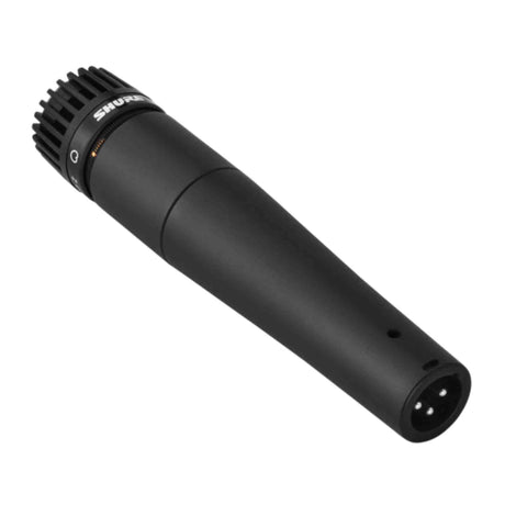 The image shows a Shure dynamic microphone, likely an SM57 or similar model from the SM series. It features a black cylindrical body with Shure branding, a ribbed cardioid grille, and an XLR connector. Known for durability and high sound pressure handling, it’s commonly used for recording instruments, live vocals, and broadcast, making it a professional industry-standard microphone.