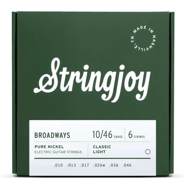 The image shows a package of Stringjoy electric guitar strings, Broadways model, 10-46 gauge, 6-string set made of pure nickel. The packaging features a forest green background, white "Stringjoy" logo, a white info panel at the bottom, and a "Made in Nashville" badge in the upper right. These classic light gauge strings offer a warm, vintage tone popular among electric guitarists.