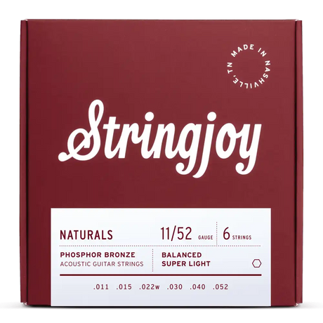 The image shows a package of Stringjoy "Naturals" phosphor bronze acoustic guitar strings in super light gauge (11-52). The deep red box features white script branding, a white info label, and a "Made in Nashville, TN" stamp. The set includes 6 strings with gauges .011, .015, .022w, .030, .040, and .052, highlighting a professional, premium presentation.
