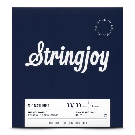 The image shows a package of Stringjoy "Signatures" 6-string bass guitar strings, gauge 30-130, nickel roundwound, long scale (34"), light tension. The packaging is dark navy blue with white text and includes a "Made in Nashville, TN" logo. This American-made set is designed for extended range and high-quality performance on 6-string bass guitars.
