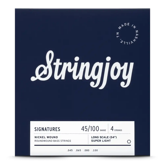 The image shows a package of Stringjoy 4-string nickel roundwound bass guitar strings, super light gauge 45-100, for long scale 34" basses. The packaging features a deep navy background with a white script logo, a white information label at the bottom, and a "Made in Nashville, TN" circular stamp in the upper right corner, highlighting its boutique, American-made quality.