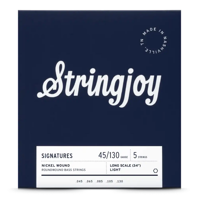 The image shows a package of Stringjoy 5-string bass guitar strings with a 45-130 light gauge nickel roundwound set for long scale (34") basses. The packaging features a deep navy background, a white "Stringjoy" logo, a bottom information label, and a "Made in Nashville TN" badge in the upper right corner, indicating premium American-made strings from a boutique brand.