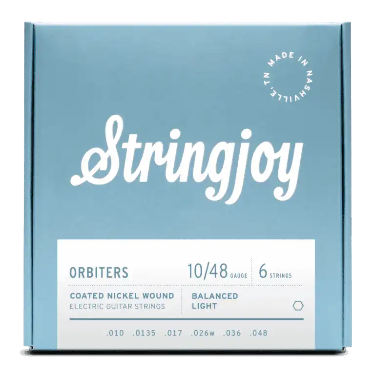 The image shows a package of Stringjoy Orbiters electric guitar strings, gauge 10/48, 6-string set. These are coated nickel wound strings with Balanced Light tension. The packaging features a blue-gray design with white text, a "Made in Nashville" logo in the top right, and the string gauges (.010, .0135, .017, .026w, .036, .048) listed at the bottom. These premium strings offer durability and balanced tension for optimal playability.