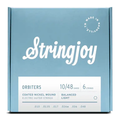 The image shows a package of Stringjoy Orbiters electric guitar strings, gauge 10/48, 6-string set. These are coated nickel wound strings with Balanced Light tension. The packaging features a blue-gray design with white text, a "Made in Nashville" logo in the top right, and the string gauges (.010, .0135, .017, .026w, .036, .048) listed at the bottom. These premium strings offer durability and balanced tension for optimal playability.
