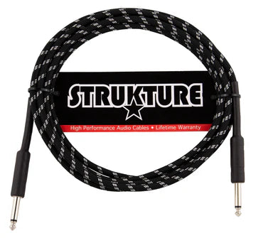 The image shows a Strukture brand guitar/instrument cable with a black braided jacket for durability and tangle resistance. It features 1/4" TS connectors on both ends and Strukture branding on the packaging. The marketing highlights "High Performance Audio Cable" and "Lifetime Warranty." The cable is coiled professionally, indicating it’s a quality, durable accessory for electric guitars, basses, keyboards, and other electronic instruments.